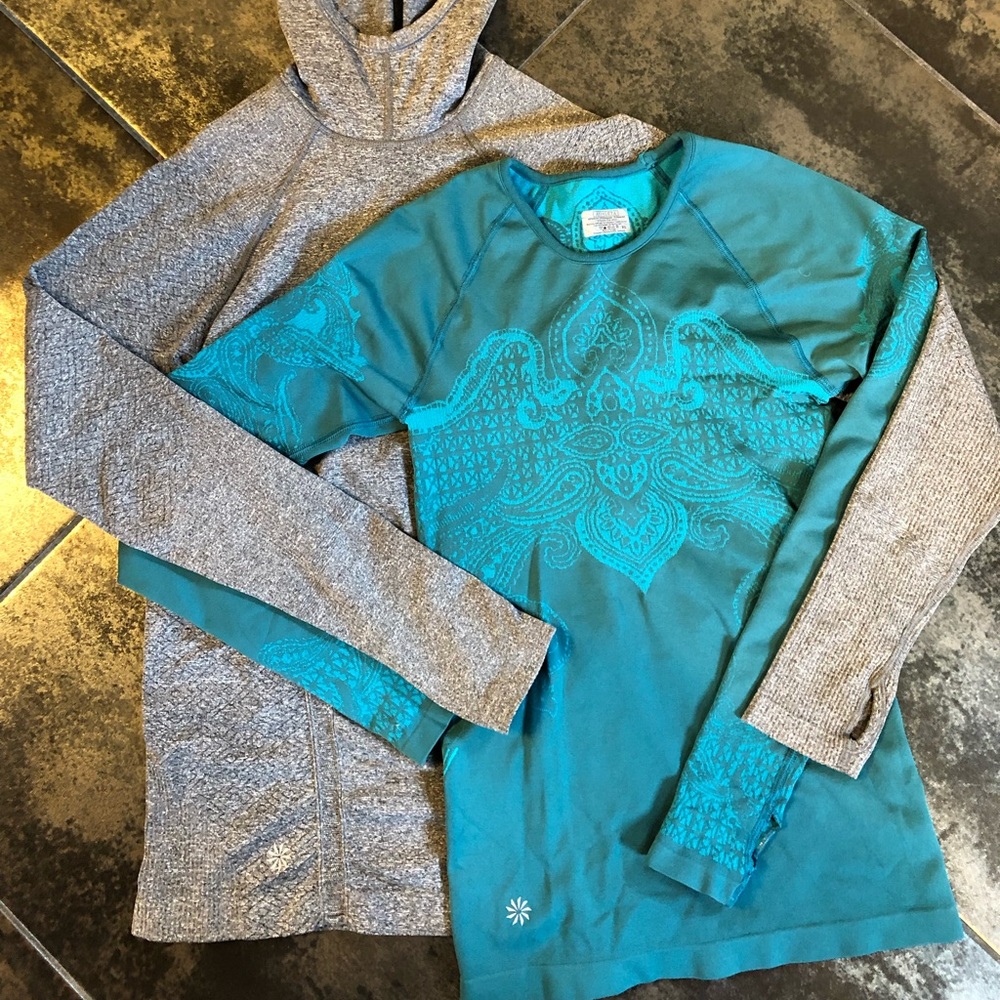 Two Athleta long sleeve workout shirts